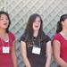 Young women singing their number.